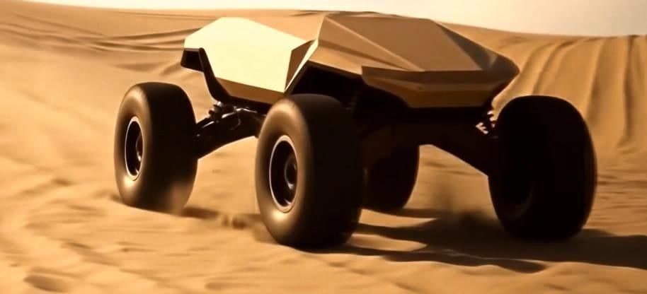 Rhino Defense unmanned ground vehicle crossing desert sand